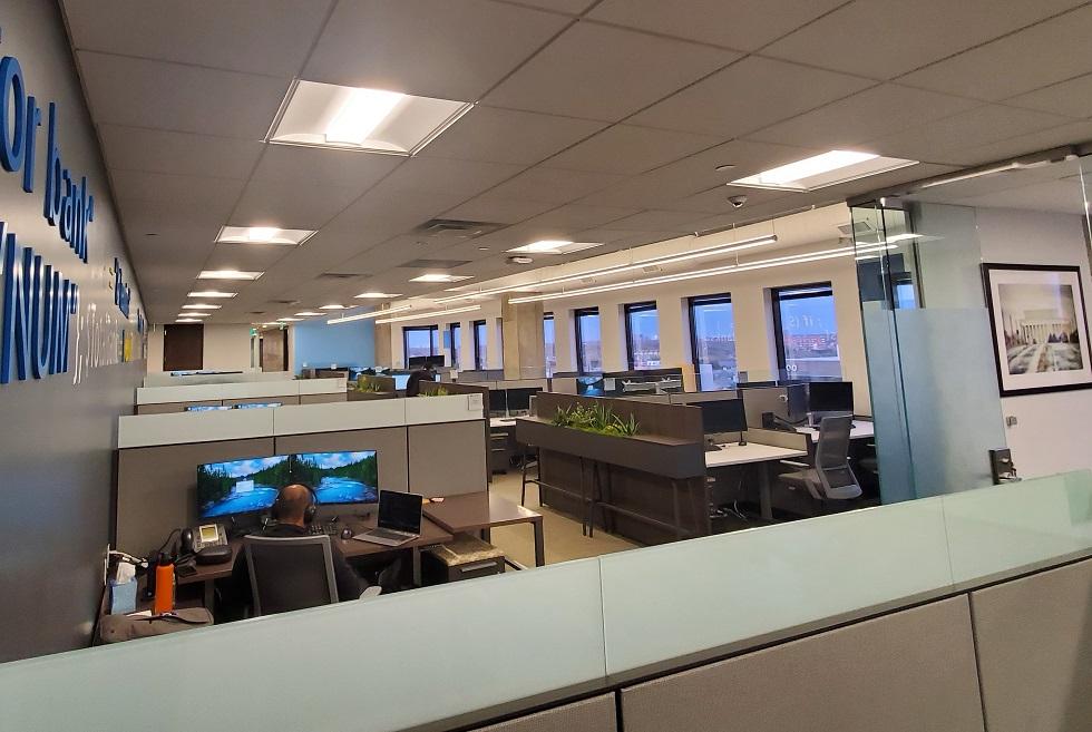 Open office area takes full advantage of windows and natural light
